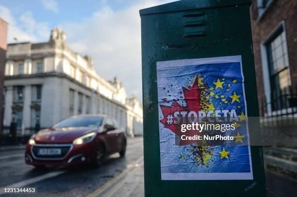 Poster 'STOP CETA' seen on street electric control box near Government Buildings in Dublin city center during Level Five Covid-19 lockdown. The...