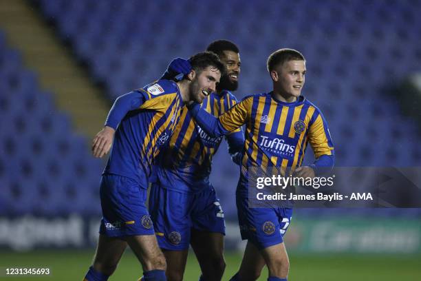 Sean Goss of Shrewsbury Town celebrates with his team mates after scoring a goal to make it 4-1 during the Sky Bet League One match between...