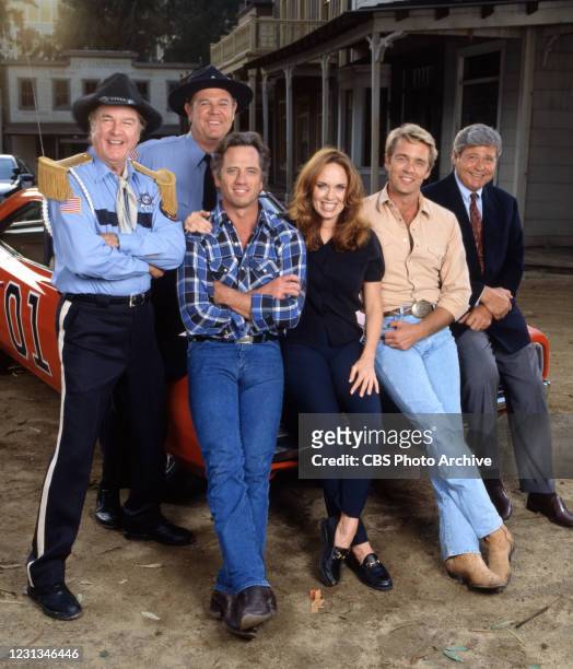 Pictured from left is James Best , Rick Hurst ,Tom Wopat , Catherine Bach , John Schneider , Ben Jones in the made for television movie, THE DUKES OF...