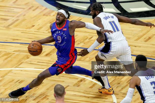 Jerami Grant of the Detroit Pistons is fouled by James Ennis III of the Orlando Magic during the second half at Amway Center on February 23, 2021 in...