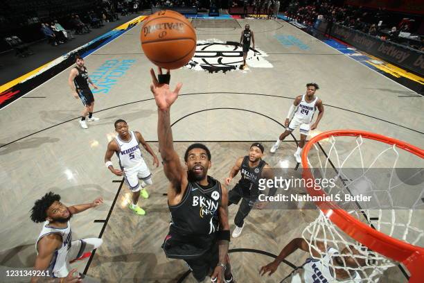 Kyrie Irving of the Brooklyn Nets shoots the ball during the game against the Sacramento Kings on February 23, 2021 at Barclays Center in Brooklyn,...