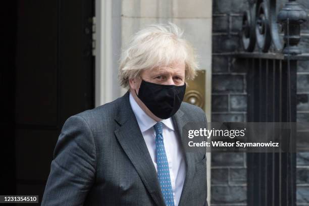 British Prime Minister Boris Johnson leaves 10 Downing Street for PMQs at the House of Commons on 24 February, 2021 in London, England. The...