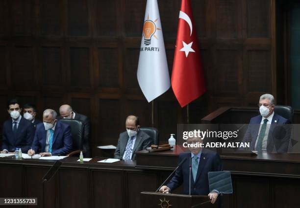 Turkish President and leader of the Justice and Development Party Recep Tayyip Erdogan delivers a speech during a meeting of members of the AK Party...