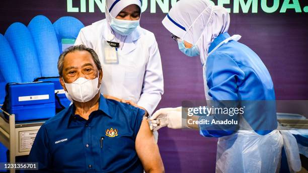 Prime Minister of Malaysia, Tan Sri Muhyiddin Yassin undergoing the Covid-19 vaccine process at the Putrajaya Health Office, Malaysia on 24 February...