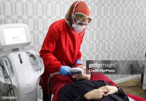 Woman undergoes a facial treatment at an aesthetic clinic in the Bogor city, Indonesia on February 24, 2021. The beauty treatment business is growing...