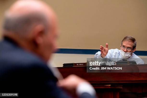 Representative Jim Jordan, R-Ohio, questions United States Postal Service Postmaster General Louis DeJoy during a House Oversight and Reform...