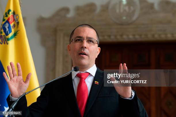 Venezuela's Foreign Minister Jorge Arreaza gestures while speaking to journalists in Caracas on February 24, 2021. - Venezuela on Tuesday expelled...