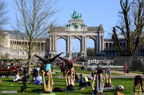 People practice acrobatics figures in front ot the "Arche du Cinquantenaire" on February 24 in Brussels, Belgium. On January 22 the federal...
