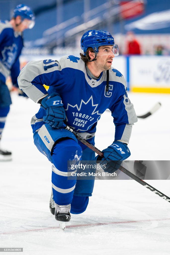 John Tavares Toronto Maple Leafs Unsigned Blue Reverse Retro Jersey Skating  Photograph