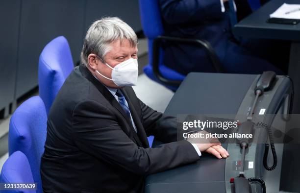 February 2021, Berlin: Hermann Gröhe, Deputy Chairman of the CDU/CSU parliamentary group, accepts congratulations from the President of the Bundestag...