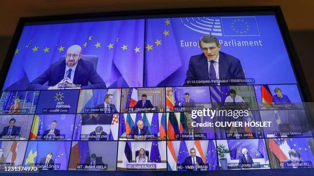 This photograph shows the screen during a video conference on the Covid-19 pandemic between European Council President Charles Michel , European...