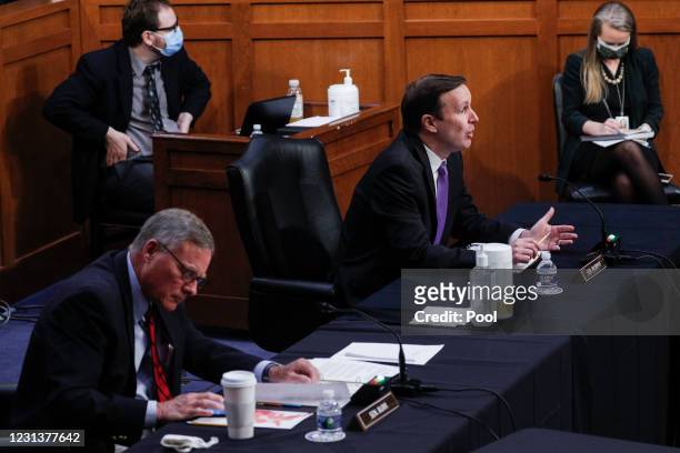Senator Chris Murphy speaks next to Ranking Member Sen. Richard Burr at the confirmation hearing for Vivek Murthy and Rachel Levine before the Senate...