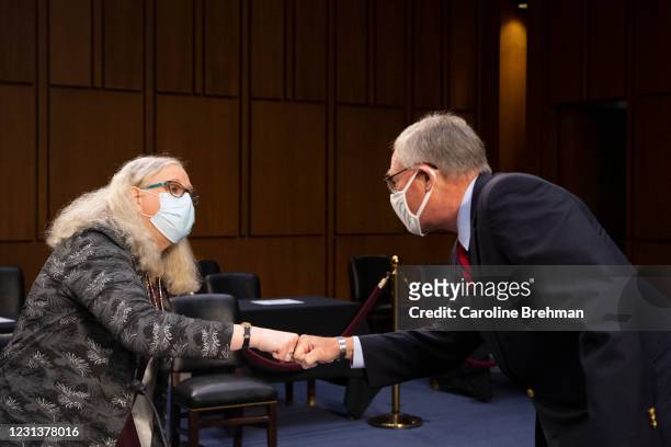 February 25: Rachel Levine fist bumps Sen. Richard Burr, R-N.C., at the end of her confirmation hearing to be Assistant Secretary, both of the...