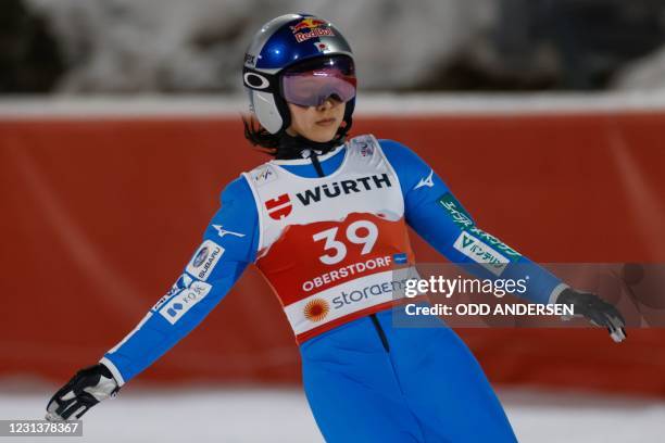 Japan's Sara Takanashi reacts after the second jump of the women's HS106 ski jumping event at the FIS Nordic Ski World Championships in Oberstdorf,...