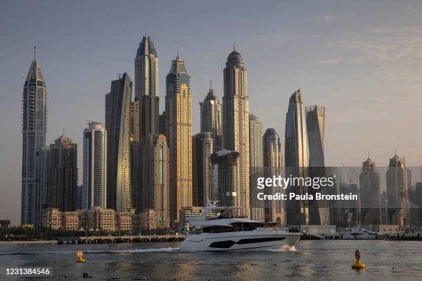 Dubai city skyline is seen from The Five hotel on The Palm on February 24, 2021 in Dubai, United Arab Emirates. Dubai is open for business, excepting...