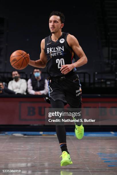 Landry Shamet of the Brooklyn Nets handles the ball during the game against the Orlando Magic on February 25, 2021 at Barclays Center in Brooklyn,...