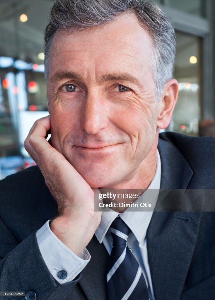 Portrait of relaxed businessman, close-up