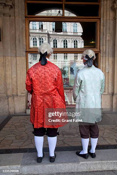 traditional costumed ticket sellers. - traditionally austrian stock pictures, royalty-free photos & images