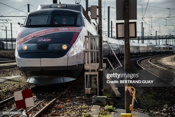 The TGV high-speed train number 16 is pictured at the South-East European Technicentre in Villeneuve-Saint-Georges on February 26 40 years after the...