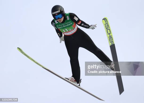 February 2021, Bavaria, Oberstdorf: Nordic skiing: World Championships, ski jumping - team event, women, trial round. Anna Odine Ström from Norway in...