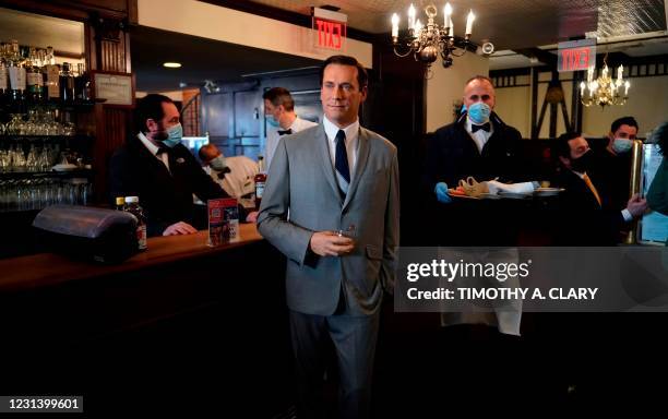 Madame Tussauds wax figure of actor John Hamm who plays Don Draper from the AMC television drama series Mad Men, is displayed inside the historic...