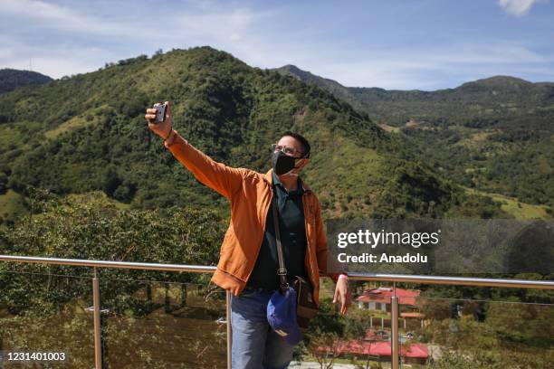 Man takes a selfie in Chinacota, a town at the Colombian-Venezuelan border that is promoting environmental and cultural tourism during the...