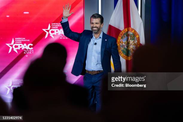 Donald Trump Jr., executive vice president of development and acquisitions for Trump Organization Inc., waves as he walks on stage during the...