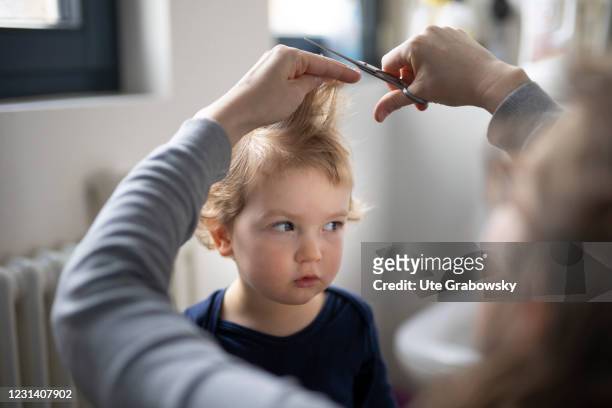 Bonn, Germany In this photo illustration a child is getting a haircut on February 26, 2021 in Bonn, Germany.