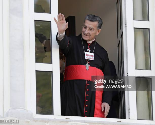 Lebanon's Cardinal Mar Bechara Boutros al-Rahi greets supporters ahead of a speech on February 27, 2021 at the Maronite Patriarchate in the mountain...