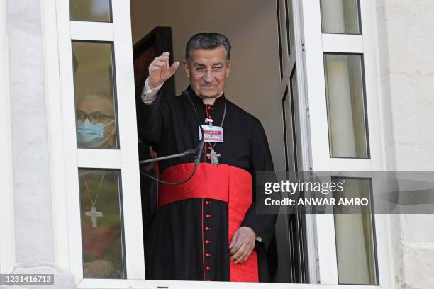 Lebanon's Cardinal Mar Bechara Boutros al-Rahi greets supporters ahead of a speech on February 27, 2021 at the Maronite Patriarchate in the mountain...