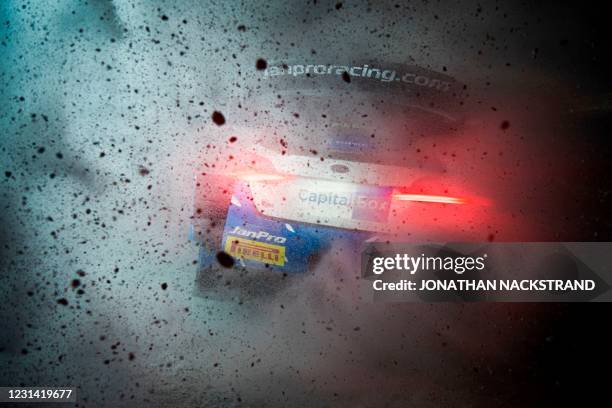 Janne Tuohino of Finland and his co-driver Reeta Hamalainen of Finland steer their Ford Fiesta WRC car during the 8th stage of the Arctic Rally...