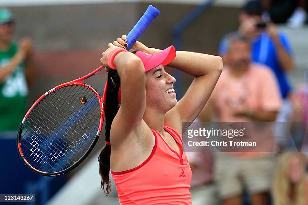 Christina McHale of the United States celebrates match point after defeating Marion Bartoli of France during Day Three of the 2011 US Open at the...