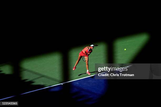 Christina McHale of the United States serves against Marion Bartoli of France during Day Three of the 2011 US Open at the USTA Billie Jean King...