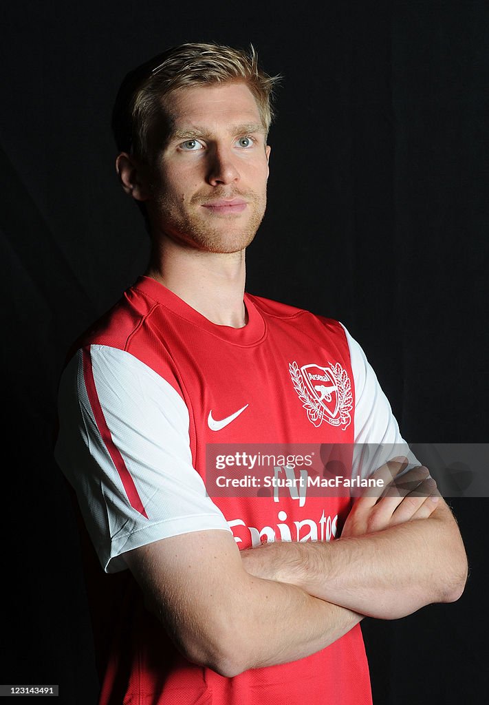 New signing Per Mertesacker poses for a portrait as he signs for