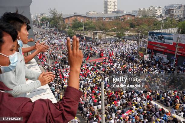 People gather to protest against the military coup in Mandalay, Myanmar on February 28, 2021.