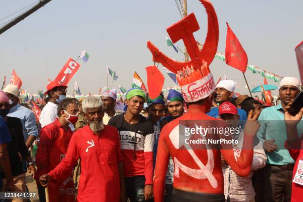 Supporters body pent Communist Party of India party symbol during Left-Congress and Indian Secular Front joint Election Campaign rally ahead of West...