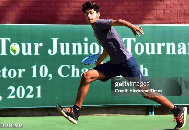 Manish Yadav in action during the ITF world tour tennis juniors tournament at the CLTA Tennis Stadium in Sector 10, on February 28, 2021 in...
