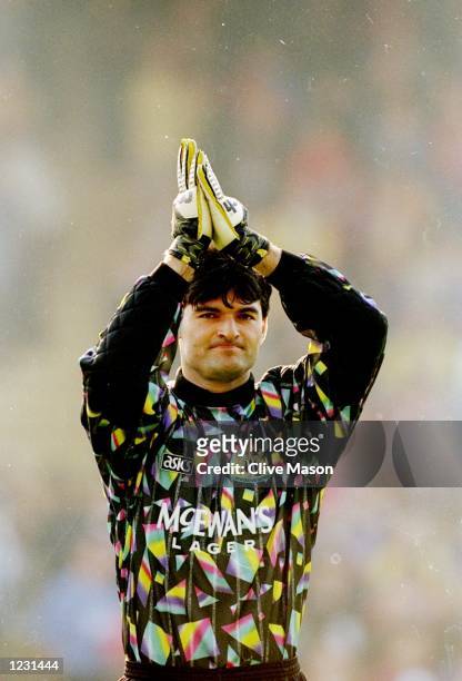 Newcastle United goalkeeper Pavel Srnicek applauds during an FA Carling Premiership match against Crystal Palace at Selhurst Park in London. \...
