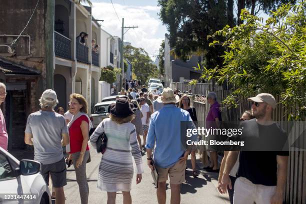 People leave an auction of a residential property in the Paddington suburb of Sydney, Australia, on Saturday, Feb. 20, 2021. Australia's housing...
