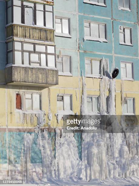 View of snow and ice covered abandoned buildings in Severny region, 17 kilometers from coal-mining town Vorkuta, Komi Republic, Russia on March 01,...