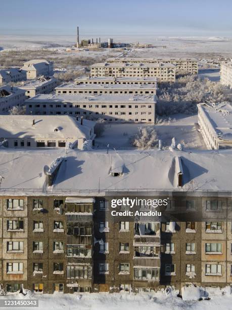 View of snow and ice covered abandoned buildings in Severny region, 17 kilometers from coal-mining town Vorkuta, Komi Republic, Russia on March 01,...