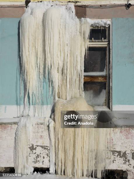 View of snow and ice covered abandoned buildings in Severny region, 17 kilometers from coal-mining town Vorkuta, Komi Republic, Russia on March 01,...