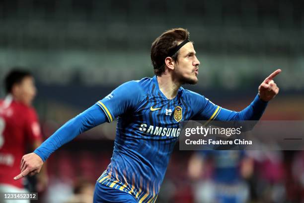 Ivan Santini, striker on Jiangsu Suning, celebrates a goal in a Chinese Super League match against Chongqing Dandai in Suzhou in east China's Jiangsu...