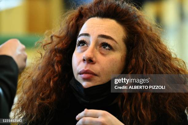 Rosa Maria Esilio, widow of slain Carabinieri military police officer Mario Cerciello Rega, looks on upon her arrival for a hearing in the trial of...