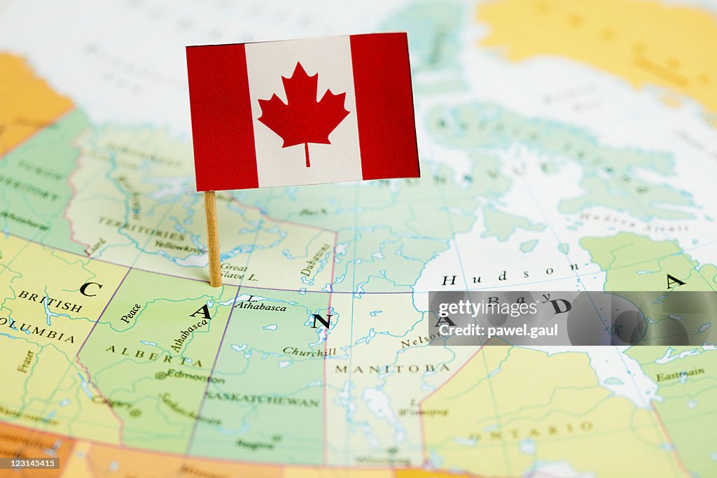 Mapa e a bandeira do Canadá