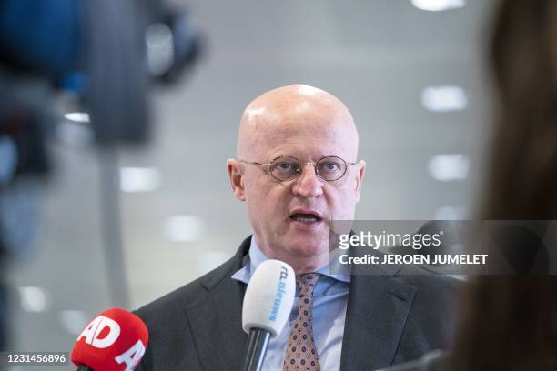 Netherlands' Justice and Security minister Ferd Grapperhaus answers journalists' questions as he arrives for the Security Council in Utrecht, on...