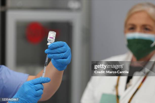 Nurse prepares the vaccine in the vaccination center, inside the Ferrari Orsi military barracks, to vaccinate people with the AstraZeneca vaccine...