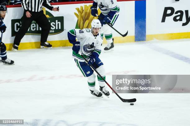 March 01: Vancouver Canucks forward Elias Pettersson looks to make a pass during the regular season game between the Winnipeg Jets and the Vancouver...