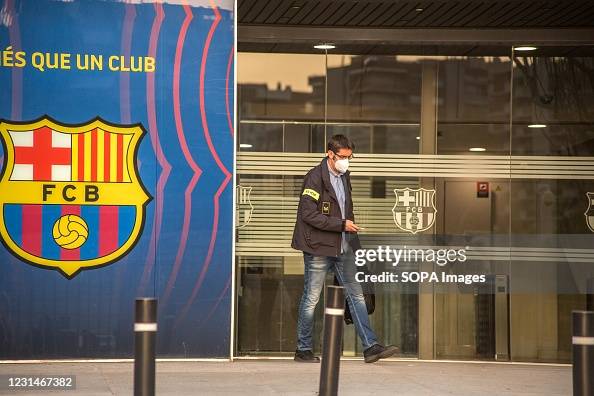 A police officer seen leaving the FC Barcelona office. A police officer seen leaving the FC Barcelona office.