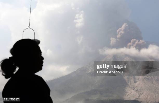 Mount Sinabung spews volcanic material during the eruption as it is seen from Tiga Pancur Village, Karo Regency, North Sumatra, Indonesia on March 2,...